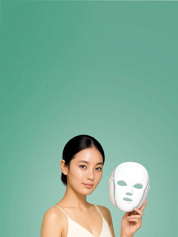 Novalight | Woman holding a white face mask against a green background